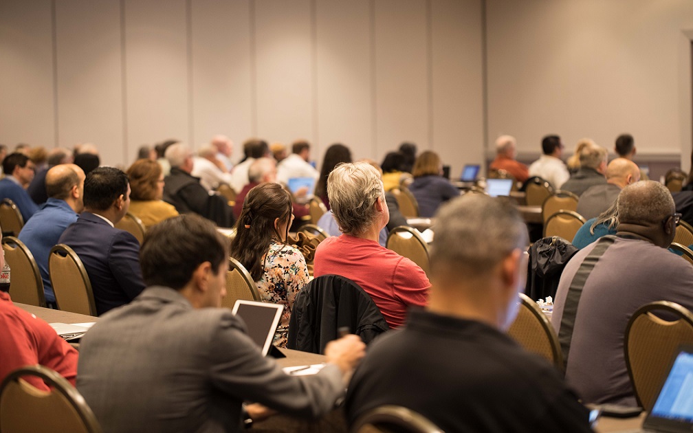 Faculty and attendees at an event